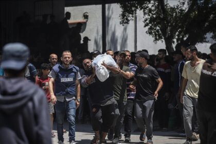 Israeli raids on central Gaza killed 34 Palestinians, including many who were waiting for help.